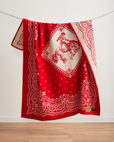 JACQUARD UNNAPPED THROW<br>RODEO SPIRIT RED