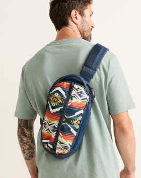 CREEKSIDE EXPLORER SLING BACKPACK<br>NAVY MULTI