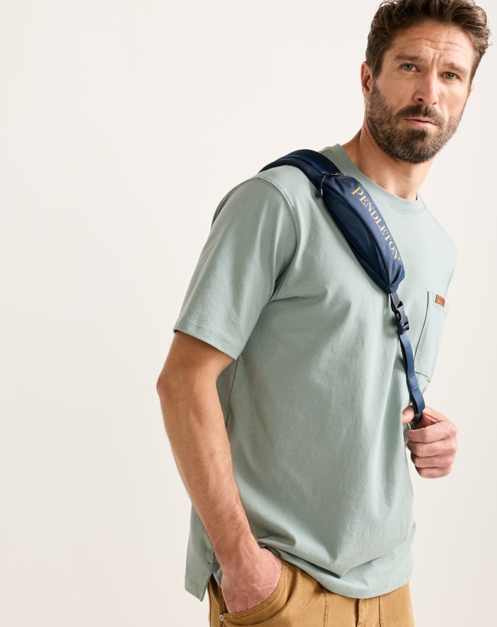 CREEKSIDE EXPLORER SLING BACKPACK<br>NAVY MULTI