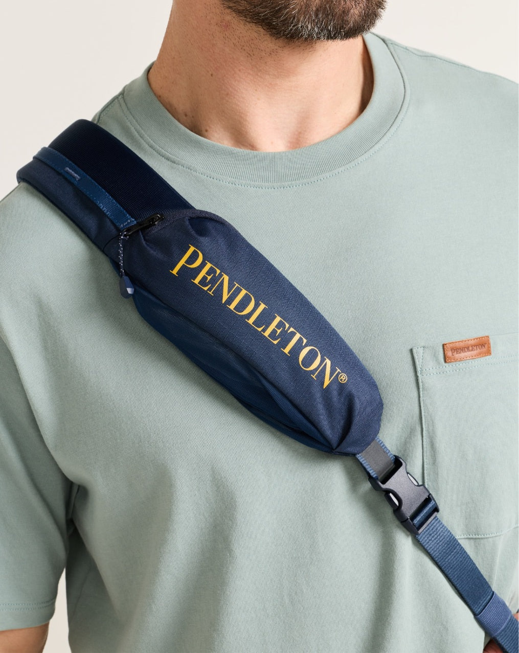 CREEKSIDE EXPLORER SLING BACKPACK<br>NAVY MULTI
