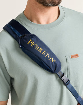 CREEKSIDE EXPLORER SLING BACKPACK<br>NAVY MULTI